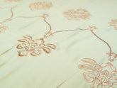 Fabric close-up of Opulence pista green embroidered 500 thread count organic cotton luxury bedsheet with elegant floral embroidery
