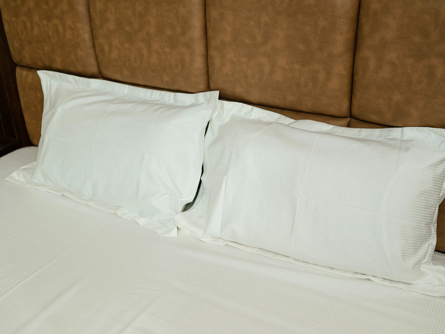 Apex minimalist luxury bedding in snow white with a 500 TC self stripe design