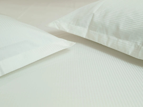 Apex minimalist luxury bedding in snow white with a 500 TC self stripe design