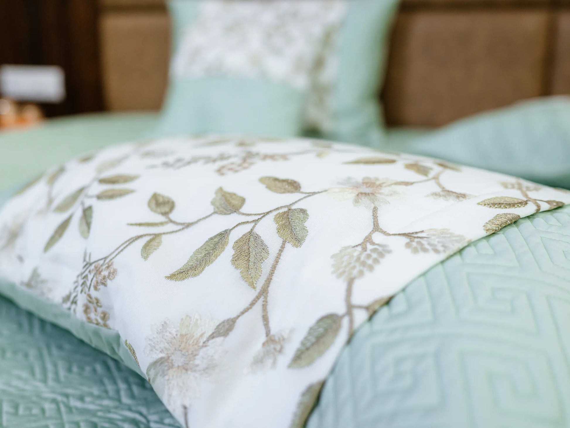 Luxury plush green 100% cotton quilted embroidered bedsheet with elegant geometric pattern and matching two pillow cover and two cushion cover with closeups