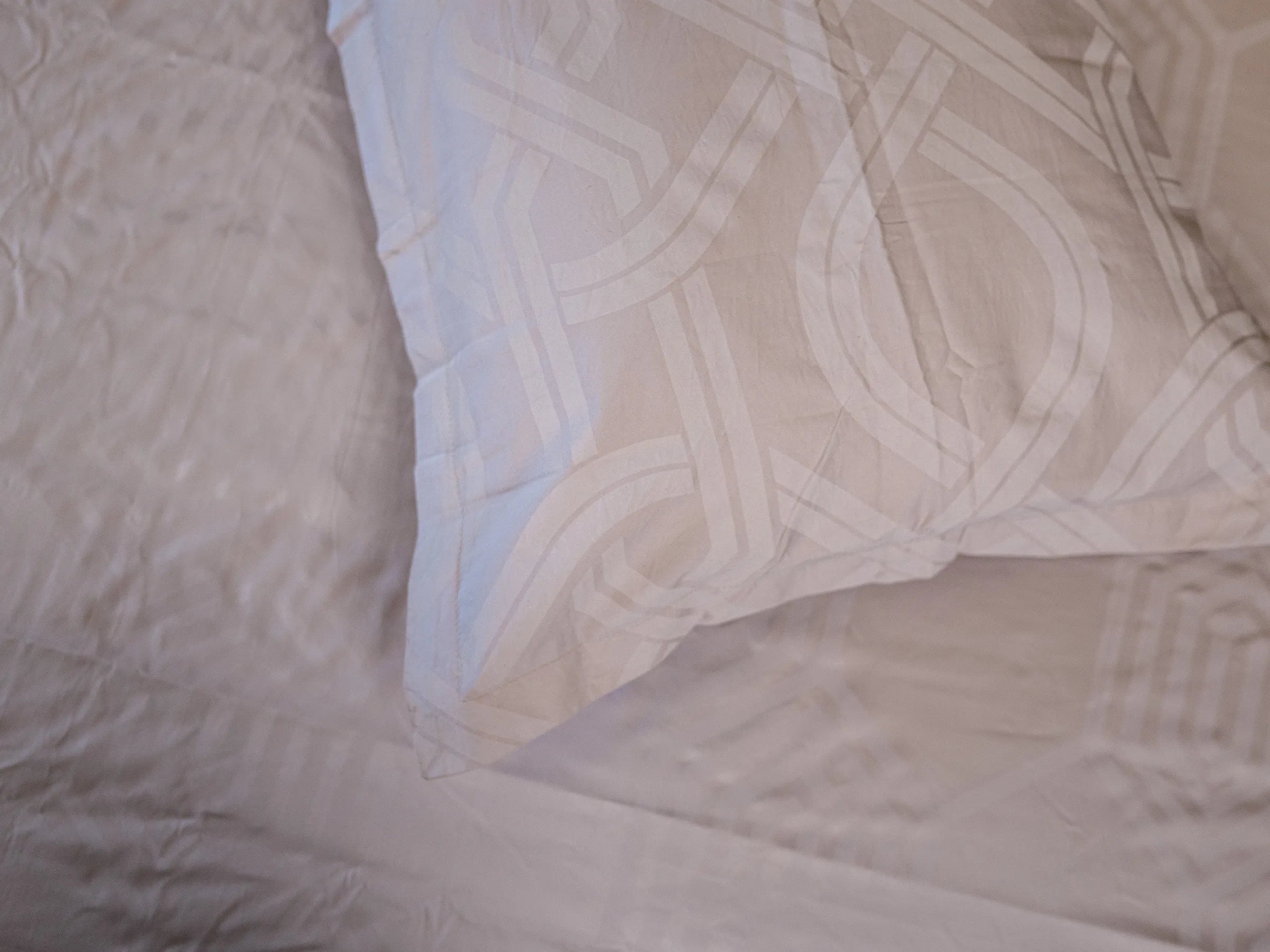 Aether steel grey pillow cover on matching jacquard bedsheet featuring refined stitching, silky-smooth texture, and premium bedroom finish