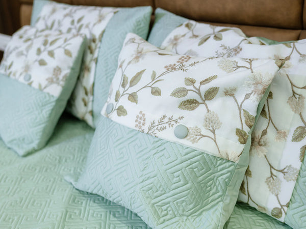 Luxury plush green 100% cotton quilted embroidered bedsheet with elegant geometric pattern and matching pillow cover and cushion cover