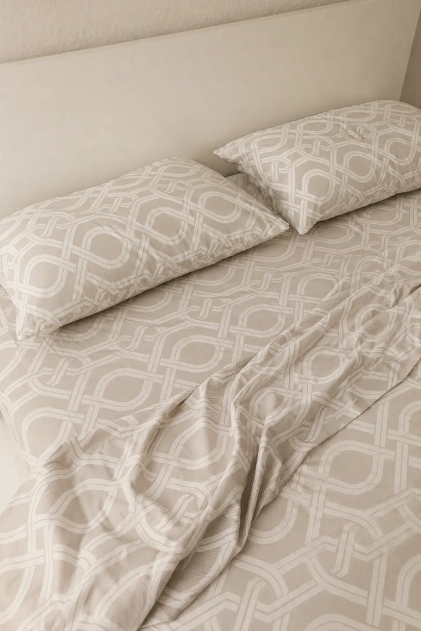 Close-up of Chaste luxury beige cotton bedsheet with matching pillow cover, highlighting soft 500 thread count fabric and hotel-quality comfort