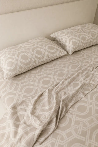 Close-up of Chaste luxury beige cotton bedsheet with matching pillow cover, highlighting soft 500 thread count fabric and hotel-quality comfort