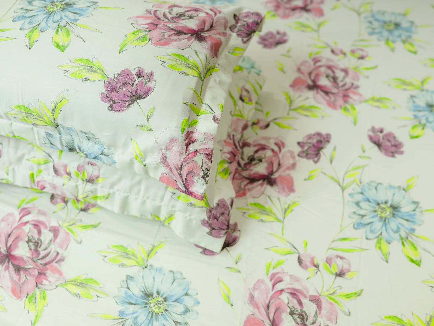 Mosaic floral bedsheet and pillow cover close-up highlighting breathable cotton fabric and refined botanical pattern