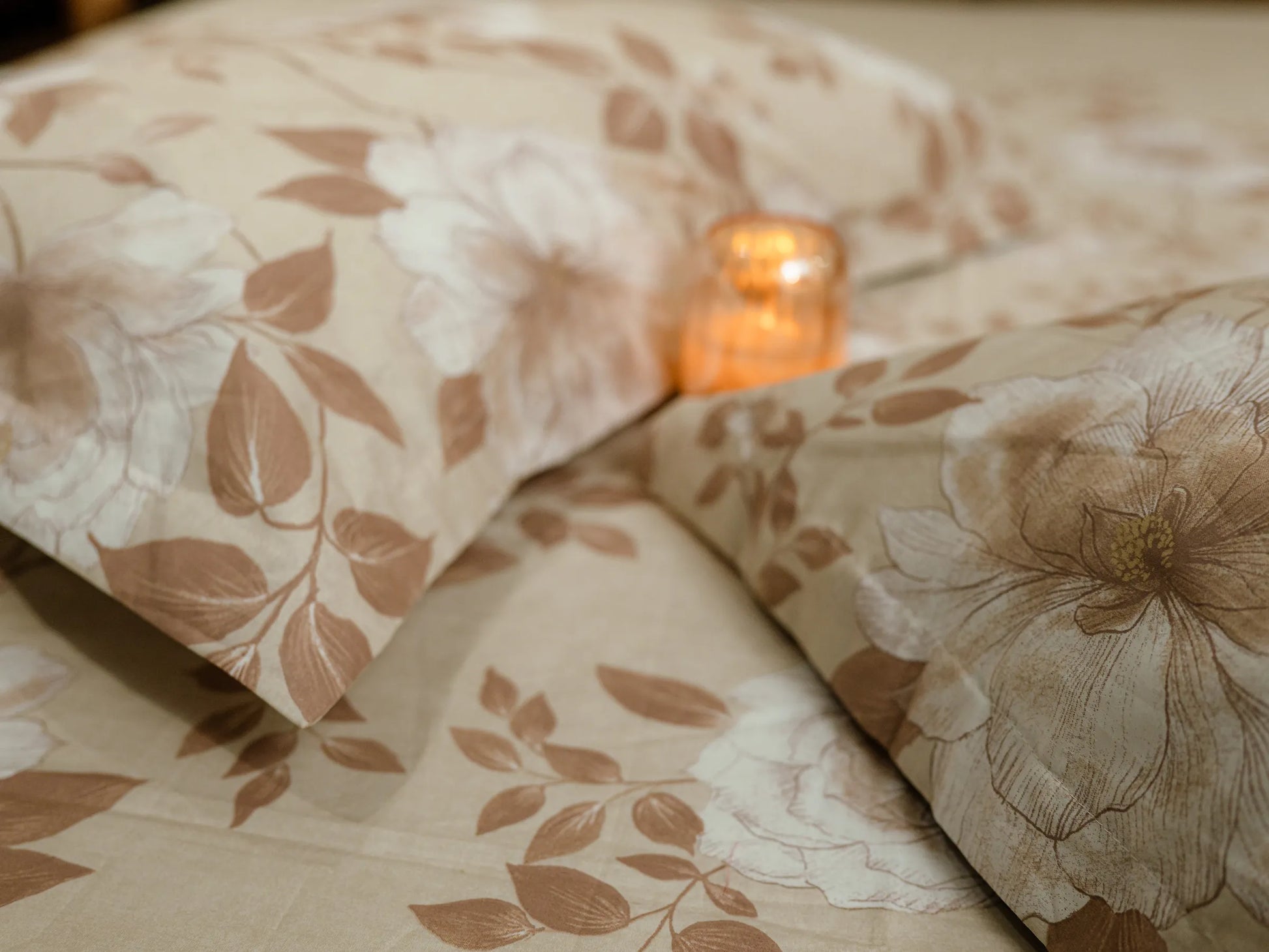 Close-up of luxury fawn and caramel floral organic cotton bedsheet showcasing soft 500 thread count weave and premium finish showcasing lifestyle photography