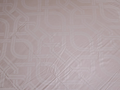 Detailed view of Pristine luxury grey cotton bedsheet highlighting sophisticated geometric interlocking design and silky-smooth finish