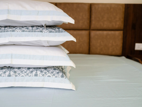Luxury ice blue organic cotton bedsheet set with two embroidered pillow covers and two plain pillow covers and premium 1000 thread count fabric