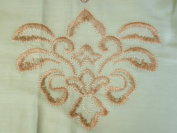 Detailed embroidery pattern on Opulence pista green 100% organic cotton luxury bedsheet showcasing premium craftsmanship