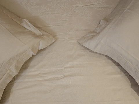 Svelte grey linen luxury bedsheet with matching pillow covers showcasing smooth 700 thread count texture and breathable premium finish