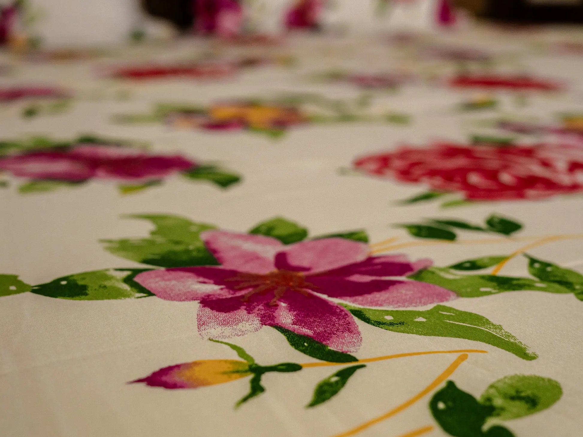 Detailed floral print on Couture white and fuchsia 500 thread count organic cotton luxury bedsheet